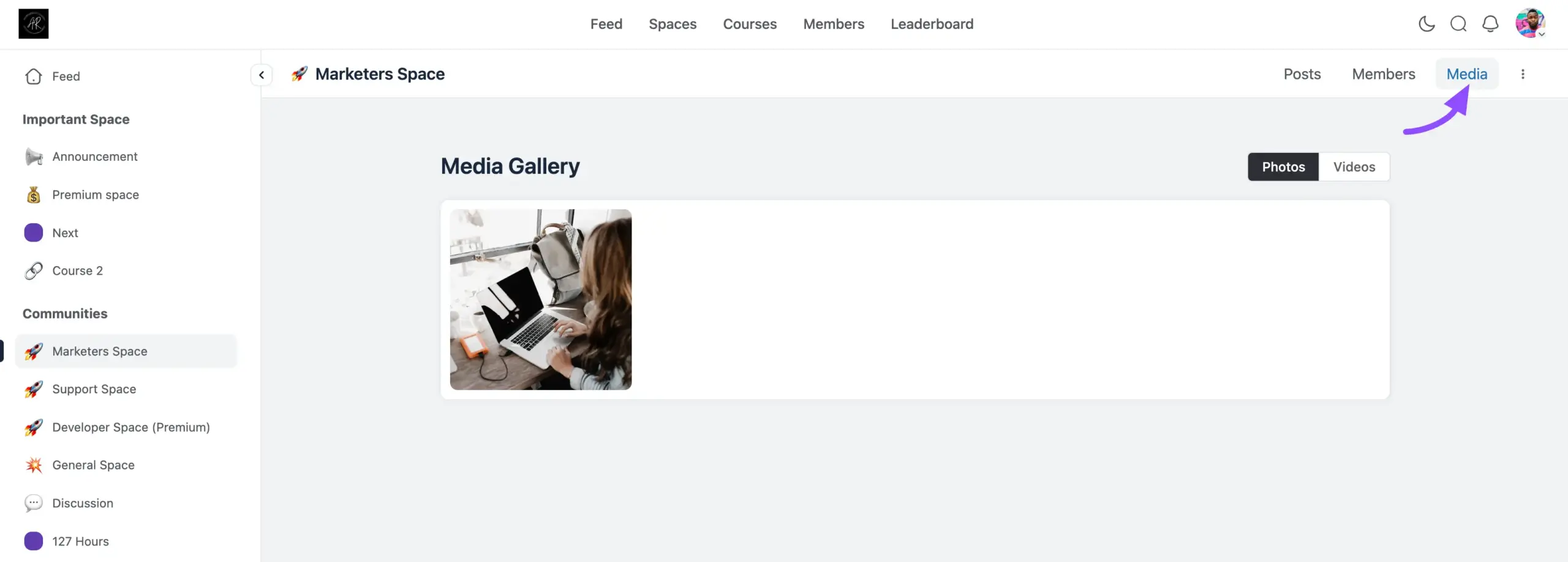 The Media Gallery page showing the Photos and Videos tabs